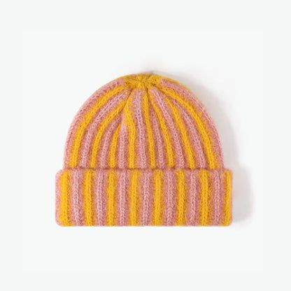 Front view of Striped Fluffy Knit Beanie in yellow coral. Perfect thermal accessory for winter sports.