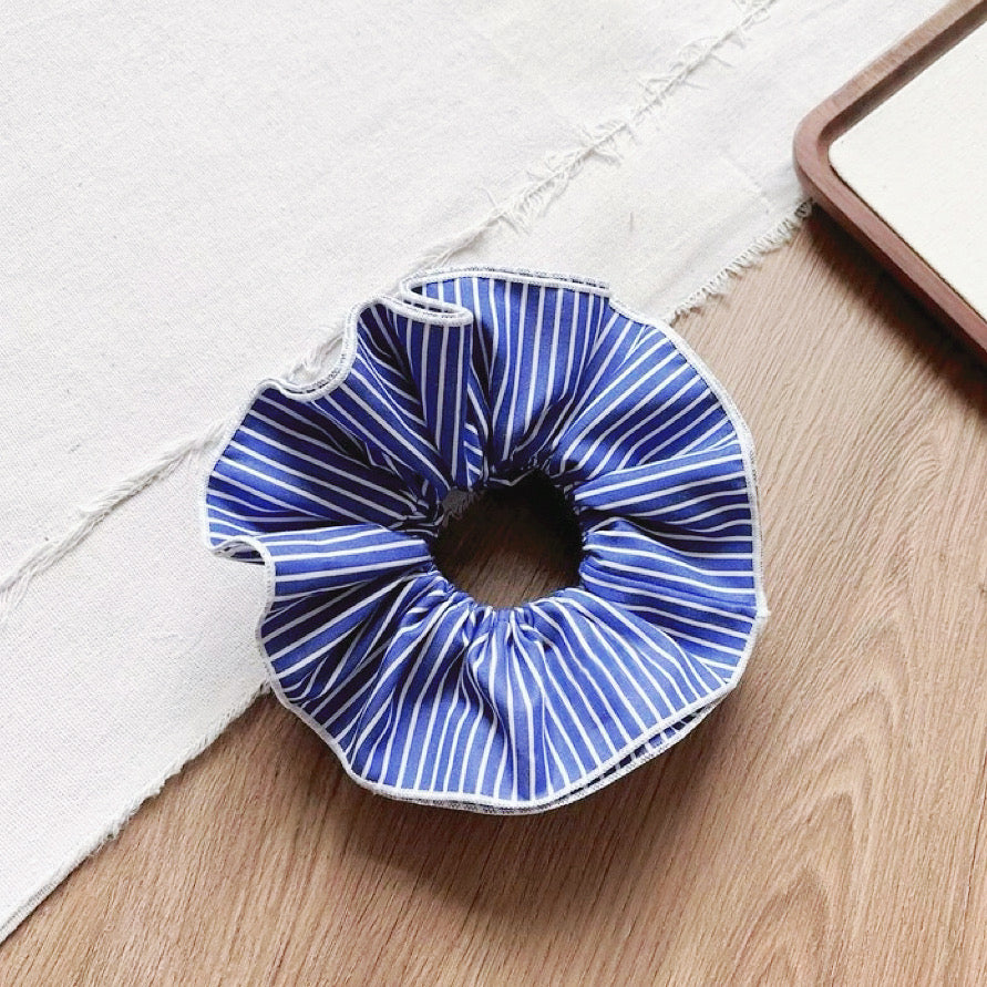 Front view of Striped Layered Scrunchie in navy blue and white.