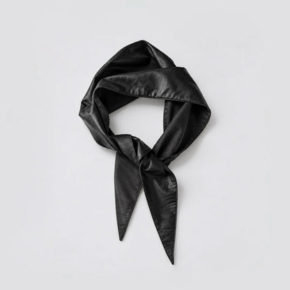 Front view of a black vegan leather triangle scarf tied in a knot on a white background.