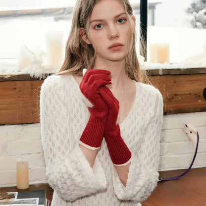 Flat lay sweetheart knitted gloves in red with heart motif; soft knit warmth for everyday winter wear.