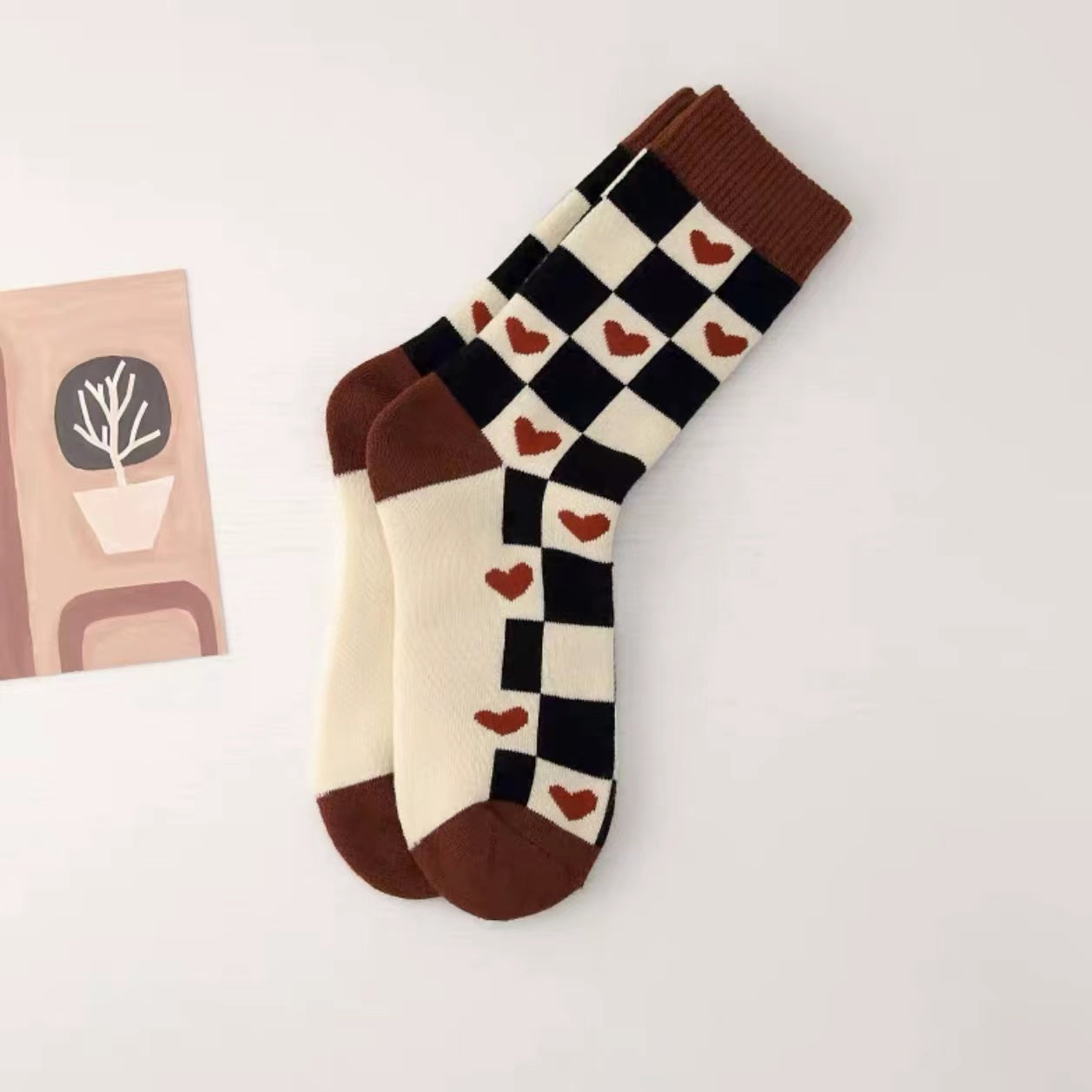 Close-up of Thick Retro Socks with heart pattern, ideal for workouts and commuting.