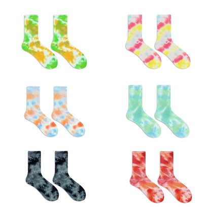 Flat lay of 6 colors of Tie Dye Cotton Socks, easy to pack for travel and errands.