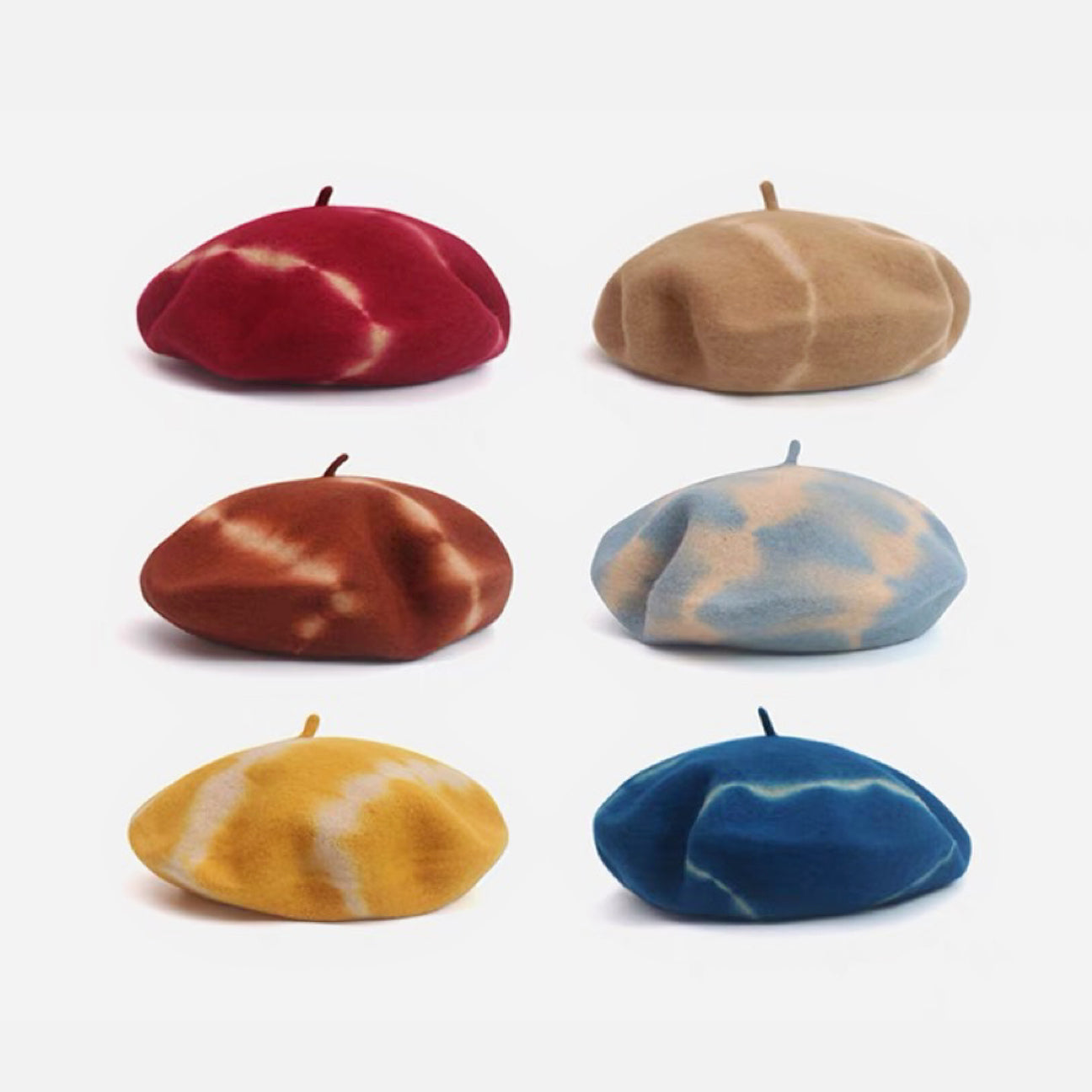 A grid showing six different tie-dye color options for the wool beret.