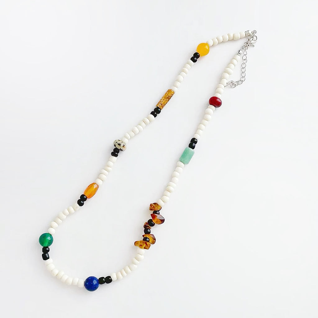 Flat lay of Vivid Hue Beads Necklace in TerraDots, great for everyday outfits.