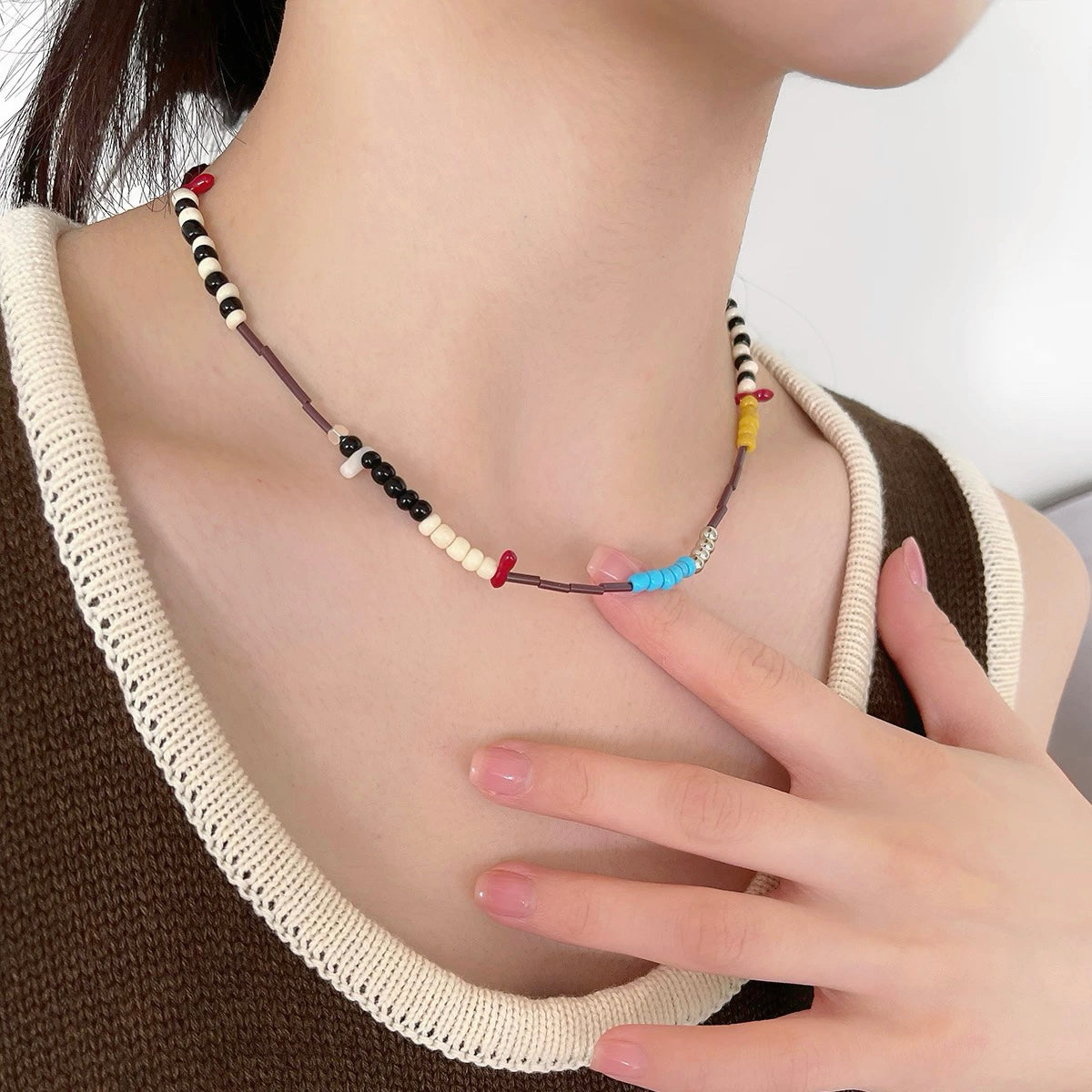Model wearing Vivid Hue Beads Necklace in TwistPop, ideal for date nights.