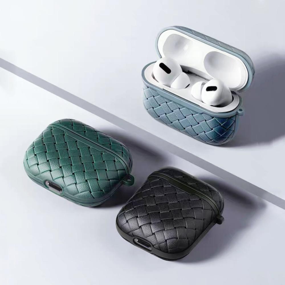 Angled view of  three Woven AirPods Case Covers, two closed and one open.