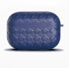 Flat lay of Woven AirPods Case Cover in dark blue, great for daily protection and travel.